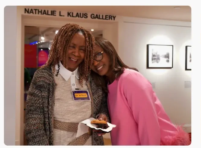 Joyful embrace at the Nathalie L. Klaus Gallery